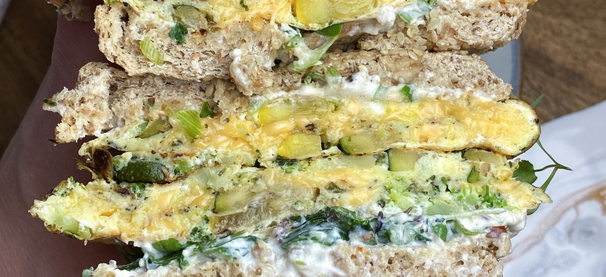 Veggie Breakfast Sandwich with Garlic Yogurt Sauce and Greens